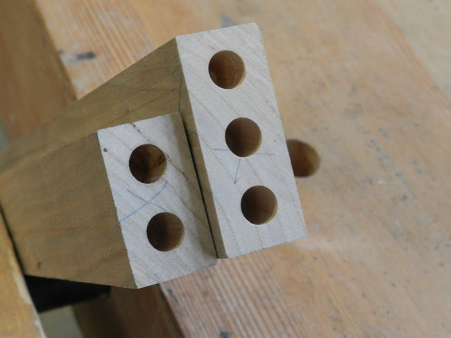 TV-stand-framework-upper-and-lower-rail-ends-with-dowel-joint-bores-drilled