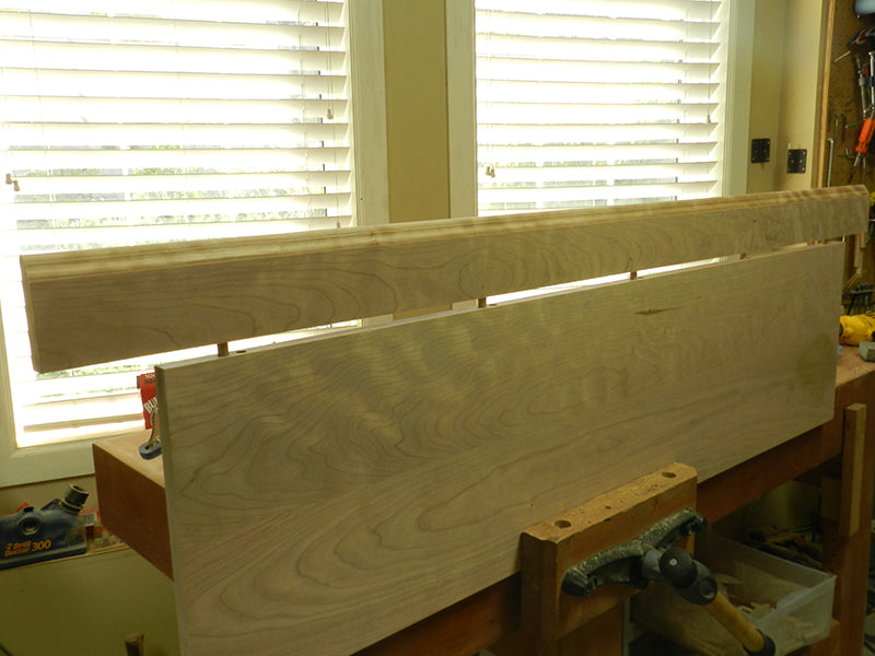Bookcase mitered edge rail dry fitted to top plate