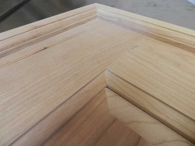 Border rails glued and screwed to footboard