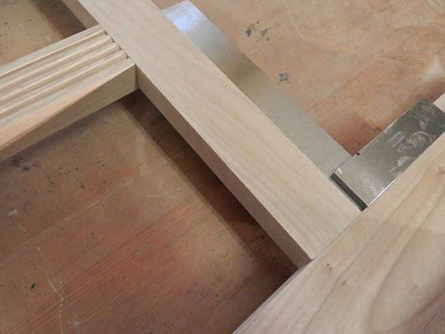 checking-TV-stand-assembled-framework-squareness-with-machined-square