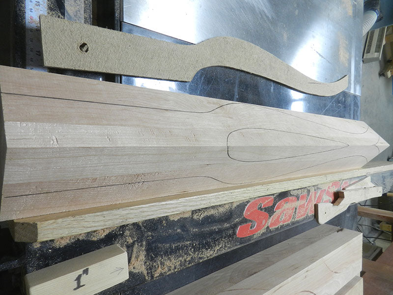 Two cherry work pieces joined together to build the bedside table leg blank with cabriole shape outline formed using template
