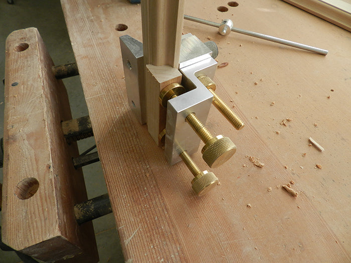 Cropped section of mirror rail used for clamping