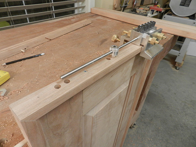Dowel bores in headboard to increase strength of raised panel