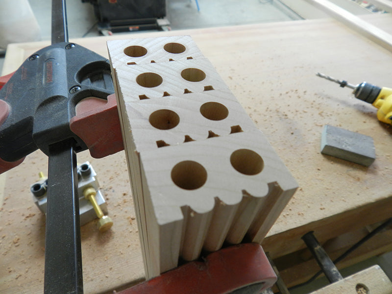 Dowel joint bores for intermediate bookcase frame rails