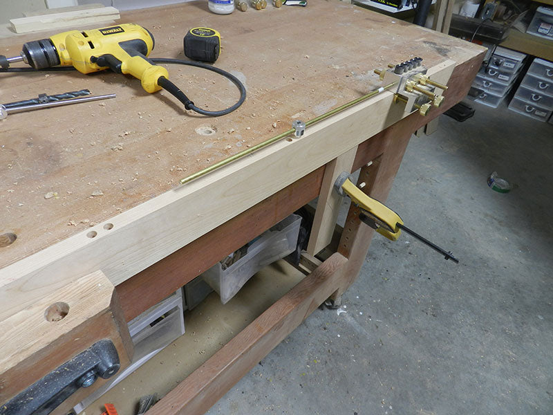 Dowel joint bores on rear rail used to build the entryway table top assembly rear perimeter section aligned using Dowelmax and distance gauge