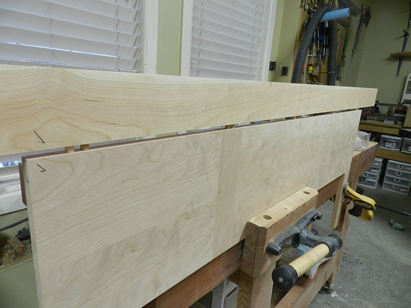 Dry fitted front rail to center panel dowel joint used to build the entryway table top assembly forward section