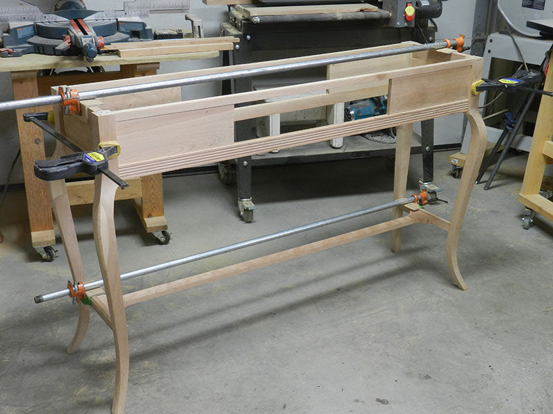 The completed entryway table frame assembly dry fitted with 50% of dowels to determine length of the longitudinal tie rail