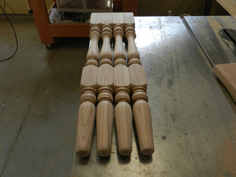 The four completed turned legs used to build the counter stool frame