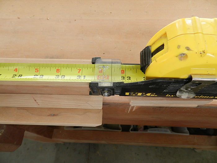 Hairline of tape measure gauge used for exact measurement