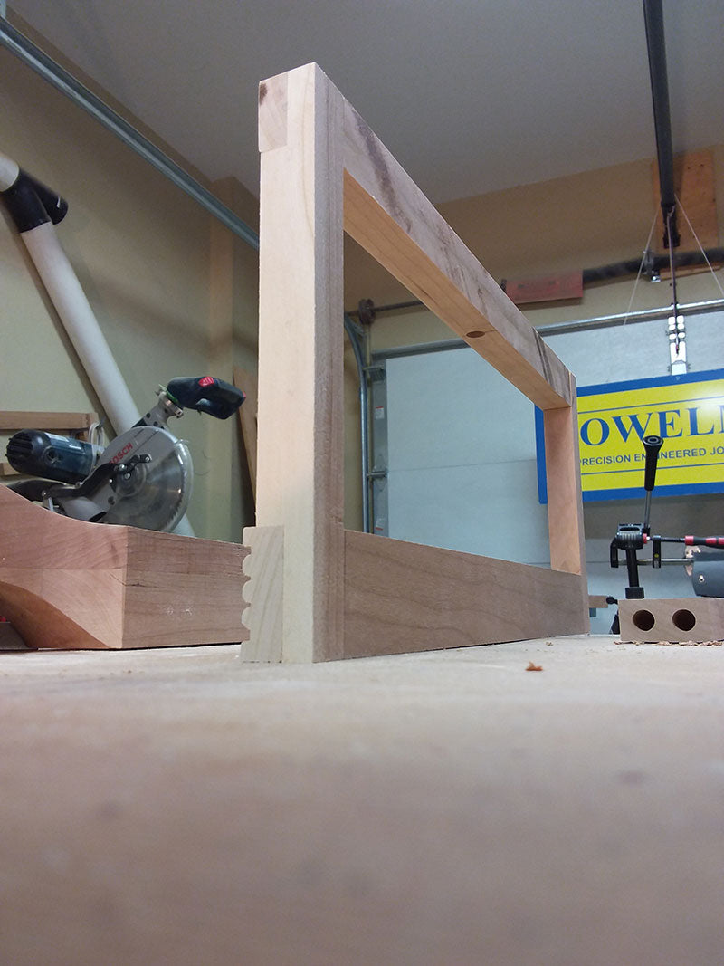 The half lap joints between the rails and stiles used to build the bedroom table drawer fascia assembly