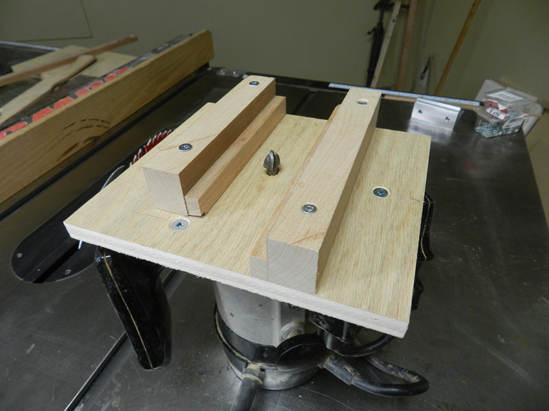 Jig for flutes on bookcase frame verticals set for center flute