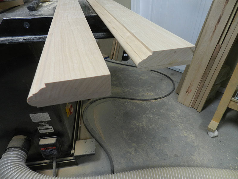 Routed profile on laminated rails used to build the entryway table top assembly perimeter section