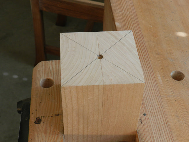 photo of location point for lathe centers at end of leg used to build the coffee table frame assembly