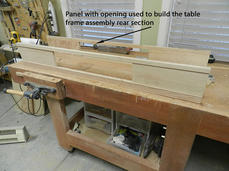 Rear panel with opening used to build the entryway table frame assembly rear section