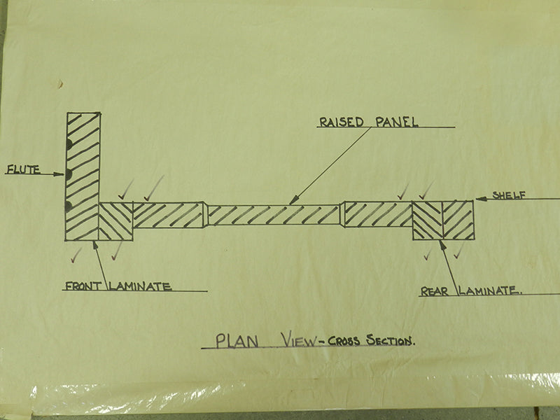 Plan view of laminated shelf post joined to raised panel side of bookcase