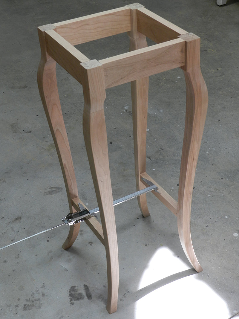 Plant stand project legs and rails dry-fitted to determine the width of the lower shelf