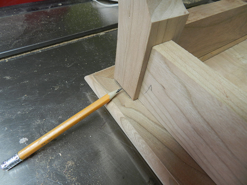 Plant stand project lower frame assembly placed upside down on top plate to mark the section to be reduced to provide overlap