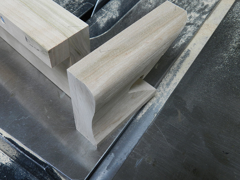 Rear bookcase rail and batten to rear foot joint surfaces