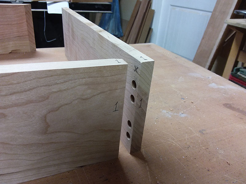 Referencing system numbers for the multiple dowel joint used to build the bedside table drawer wall rear section