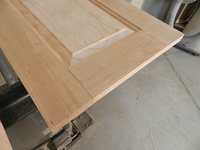 Roughed out section of bed footboard