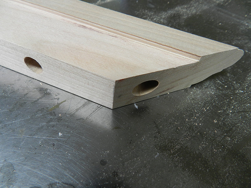 Lower surface of the plant stand top perimeter rail reduced to provide the overlap connection to the lower frame section