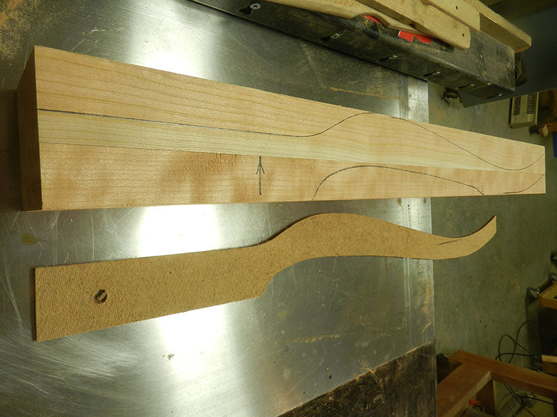 The template lines marked on the joined work piece used to build the bedside table leg are designed to miss the joint seam at the middle