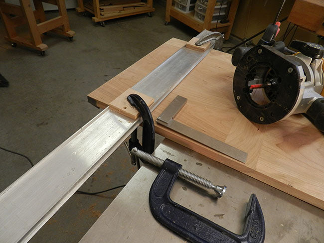 trim-end-TV-stand-top-square-with-router-along-straight-edge