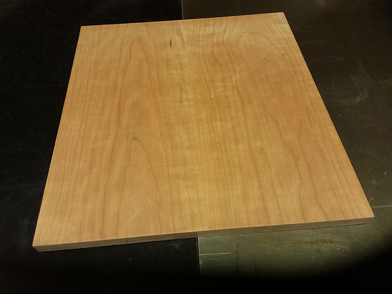 Two work pieces joined edge to edge with six dowels to build the bedside table shelf assembly